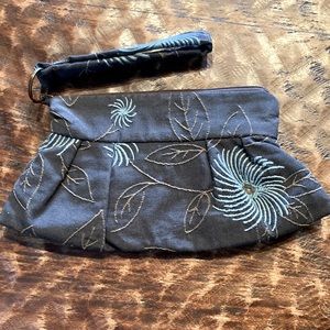 Sweet embroidered wristlet/clutch bag.